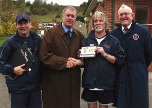 Jasper Cook (extreme right) at a presentation with Geoff Hurst © Steve Cassidy